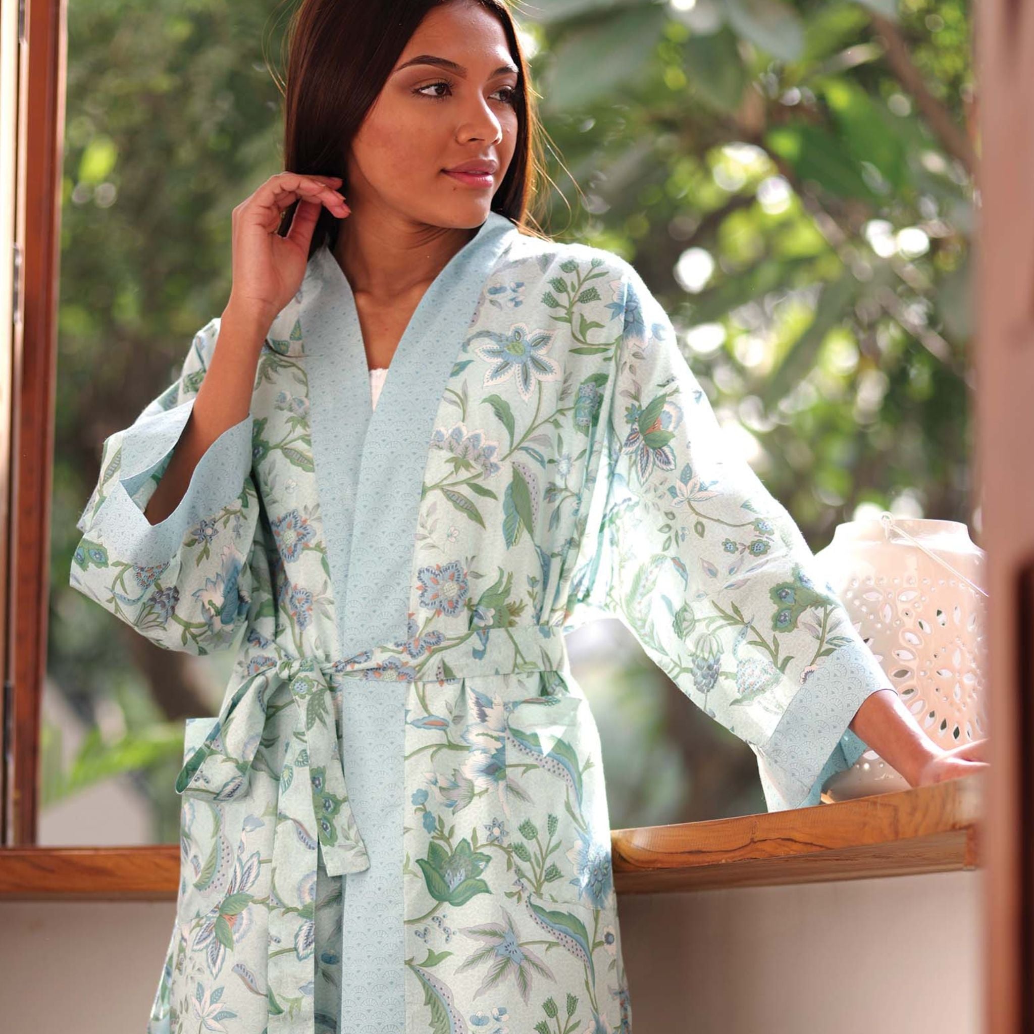 One Size, Soft Cotton Kimono for Loungewear or Travel, handprinted in India. Kerala Aqua. Light background with green blue leaves and floral.