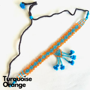 Maniya Kalbelia Beadwork Necklace Haar with Pendant Turquoise Center with Orange Edging