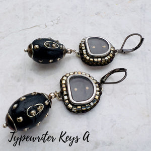 Earrings by Elaine Graham of Panache Design. Made in Washington, USA. Typewriter Keys A Side View.
